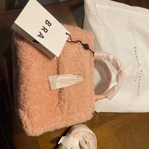 Brandon Blackwood pink bag shearling mini kuei New York cross body strap
